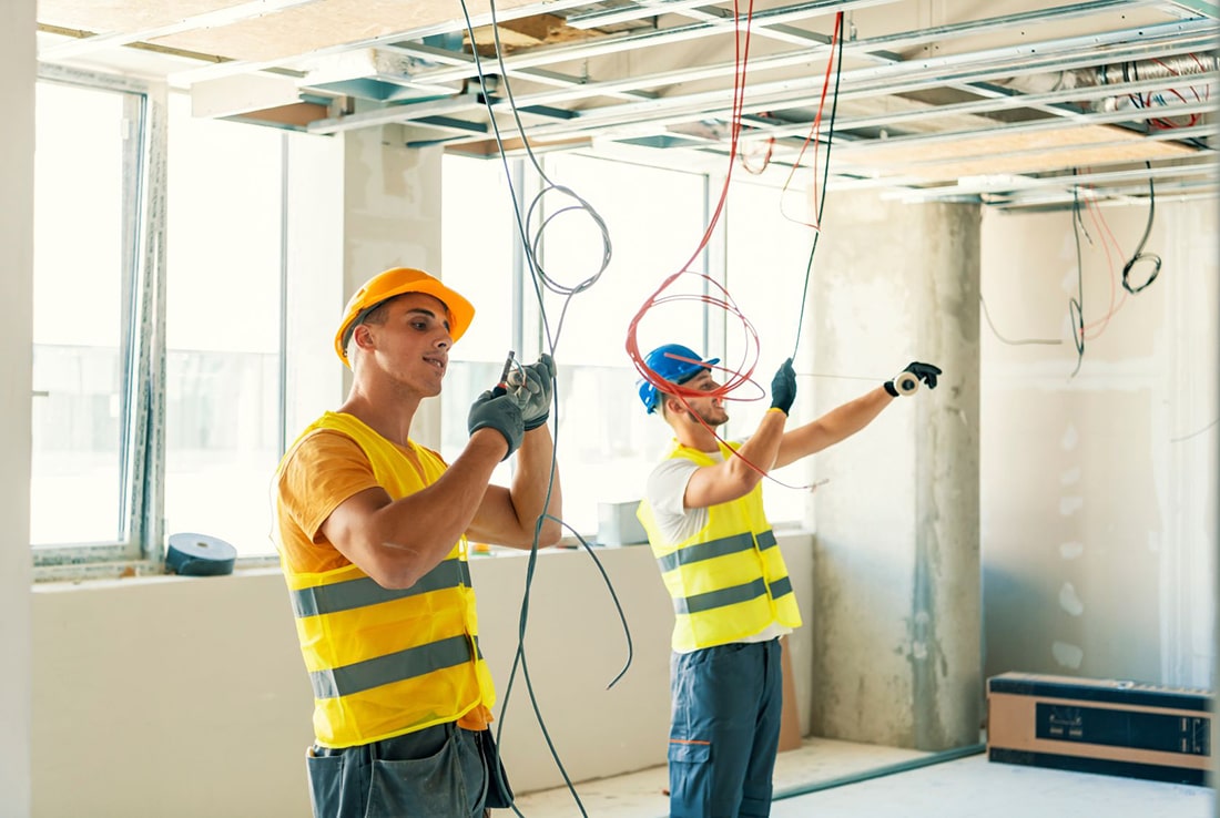 Electricians Doing Work
