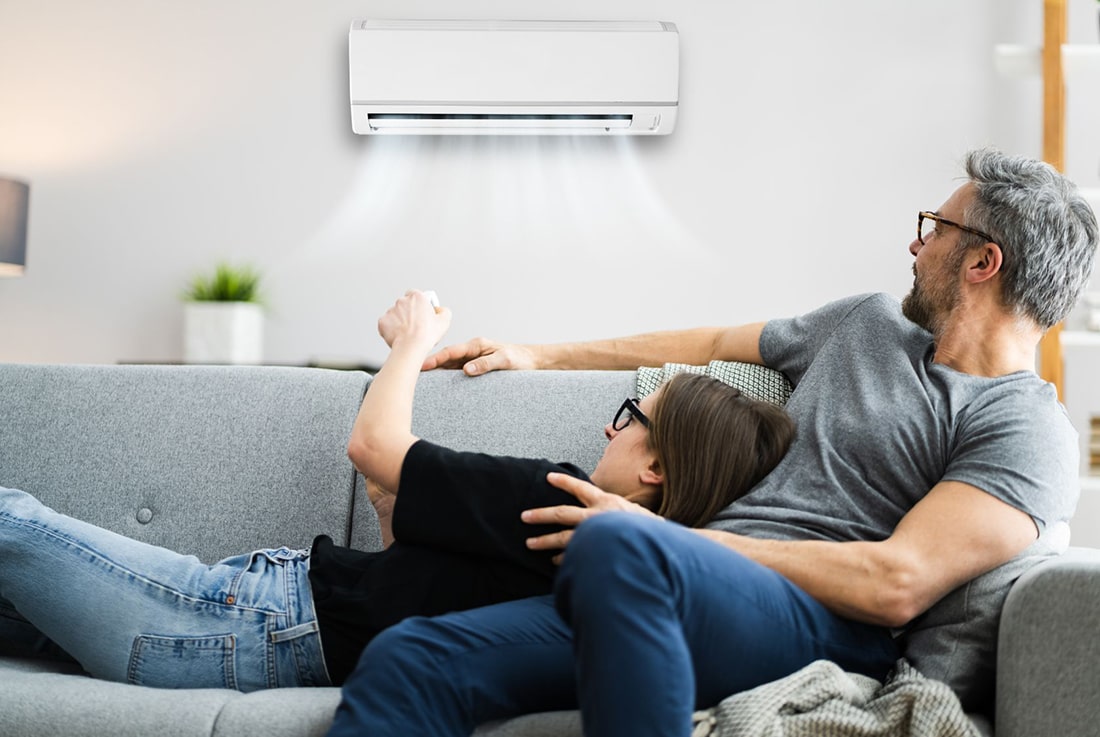People Enjoying Their Air Conditioner